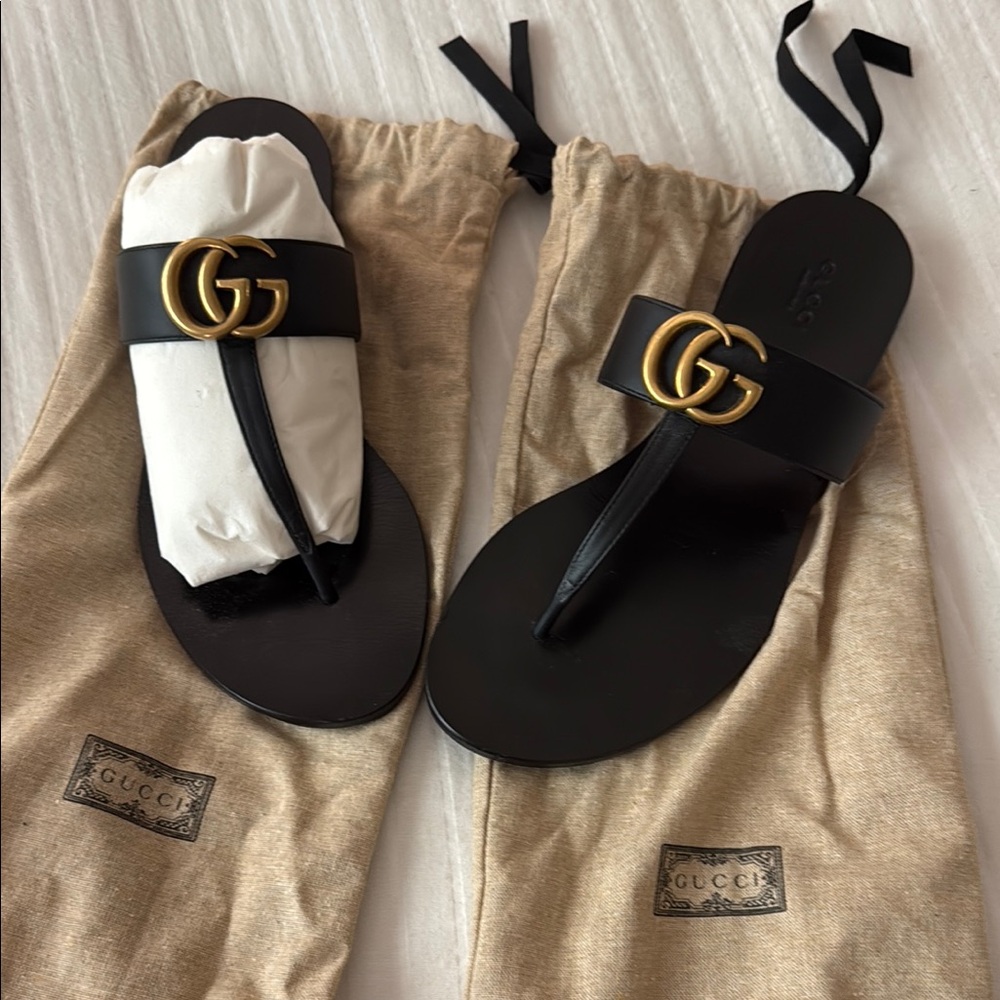 Gucci Black Sandals with Gold Emblem